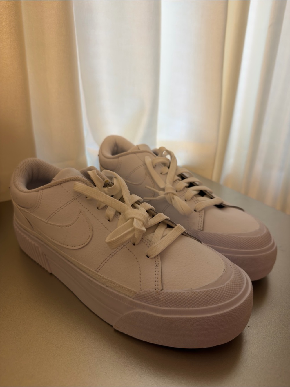 Nike All-White Platform Signature Sneakers